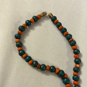 Blue and orange bead necklace
